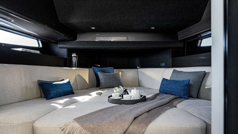 Dining area convertible in additional berth