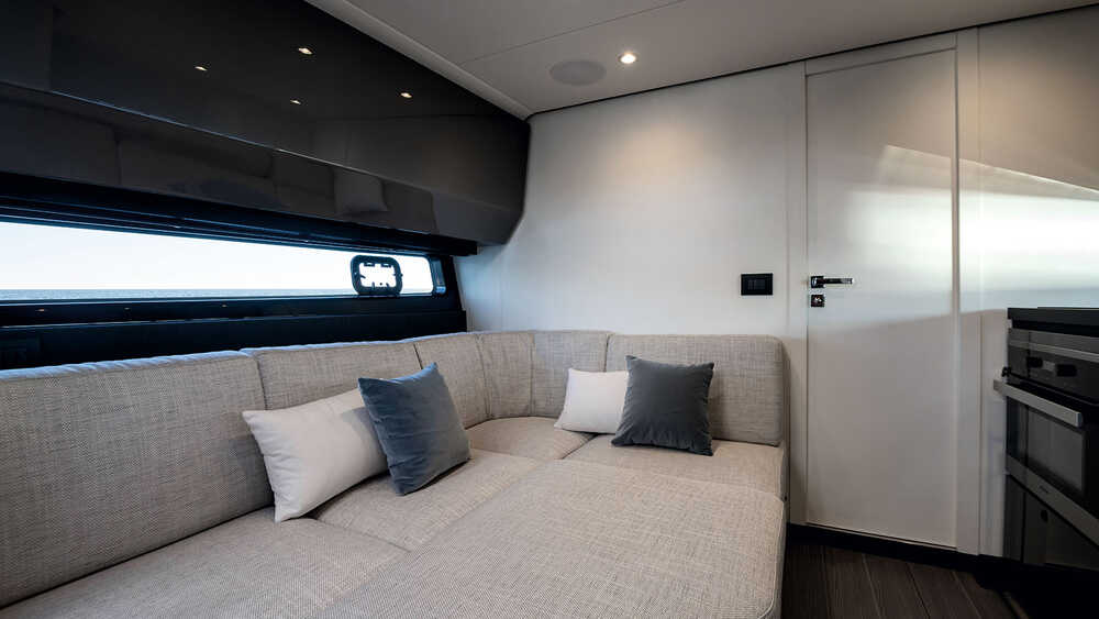 Dining table convertible in additional berth