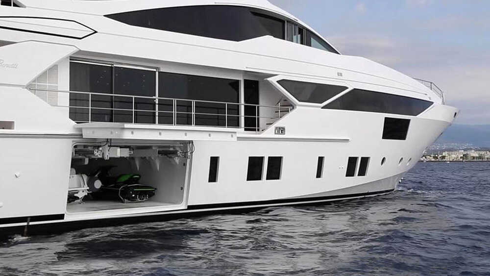 Side garage for tender, jet skis and water toys