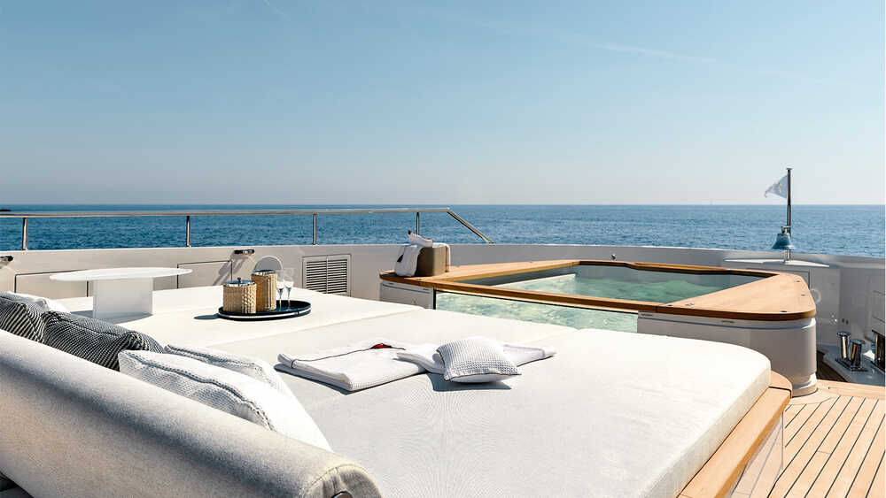 Sunbathing cushions and jacuzzi on bow upper deck