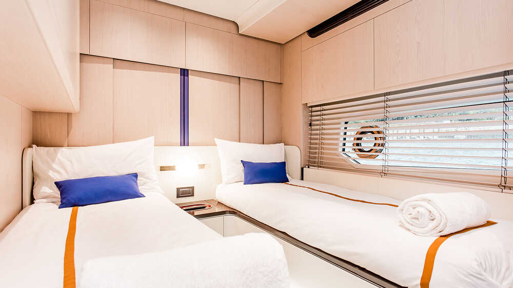 Guest cabin on starboard side with twin beds