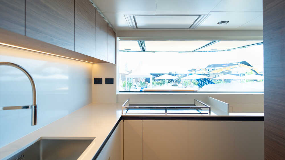 Galley with roll-down window