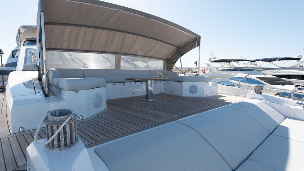 Sofas with bimini top on bow