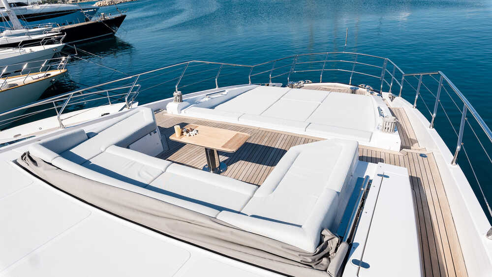 Sofas and sunbathing cushions on bow